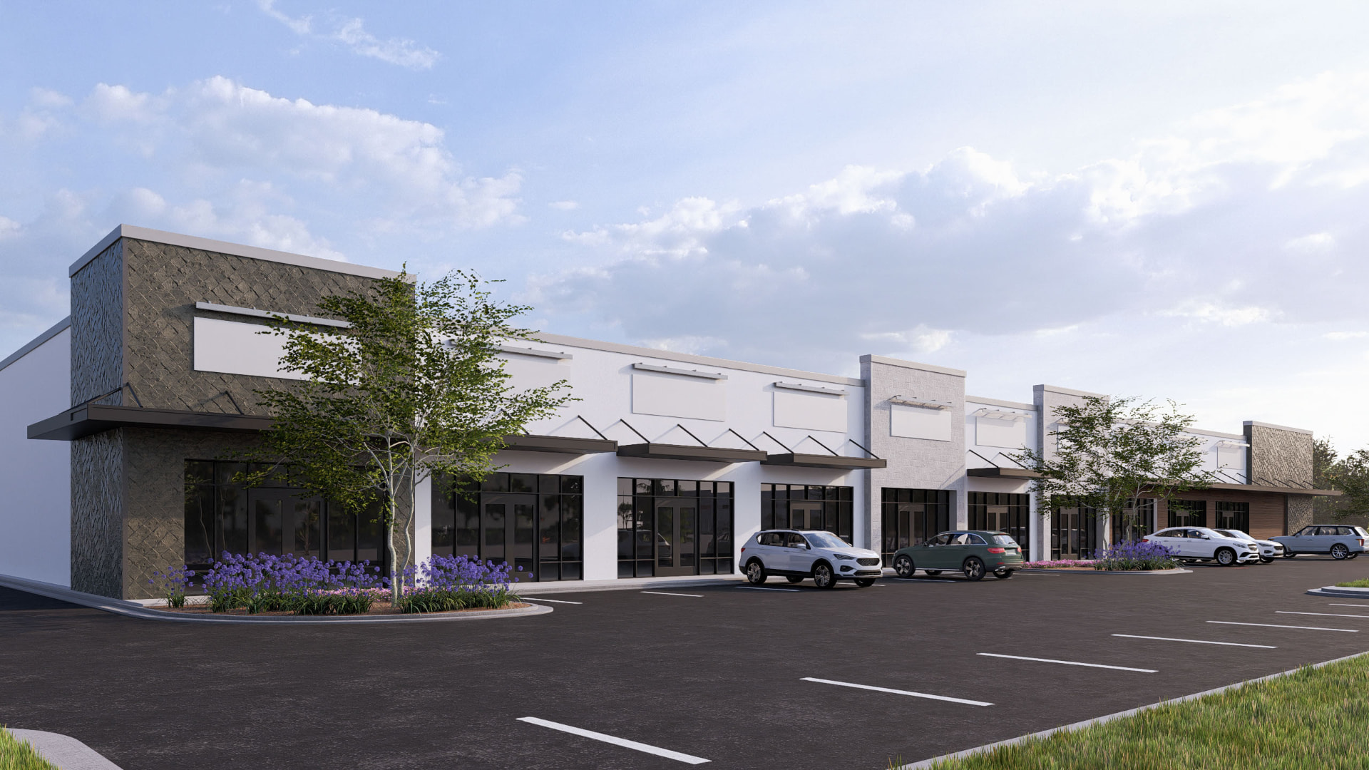Spencer Plaza storefront row with glass entries and awnings
